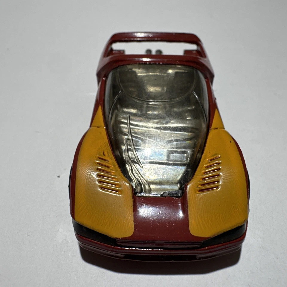 Coche deportivo Quasar Peugeot 1986 vintage rojo amarillo fundido a presión hecho en Macao Foto 2 de 4