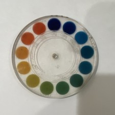 The Hach Color Disc No. 1919 is a visual color comparator disc