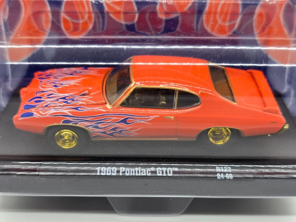 2025 M2 Machines Drivers Orange Blue Flames 1969 Pontiac GTO Chase R123 24-69 - Image 2 of 4