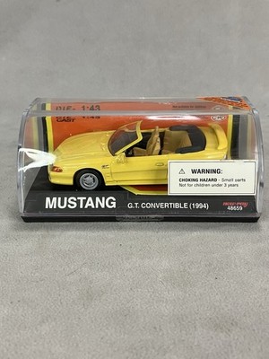 New Ray  1:43 Die Cast Yellow 1994 Ford Mustang GT Convertible