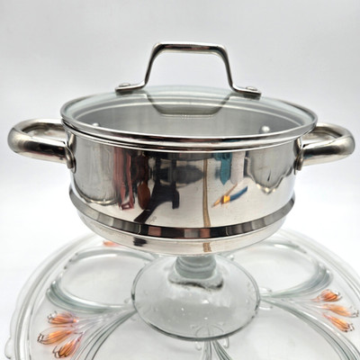7'' Top Width Stainless Steel Pot Strainer With Glass Lid Bottom Width is 6''.