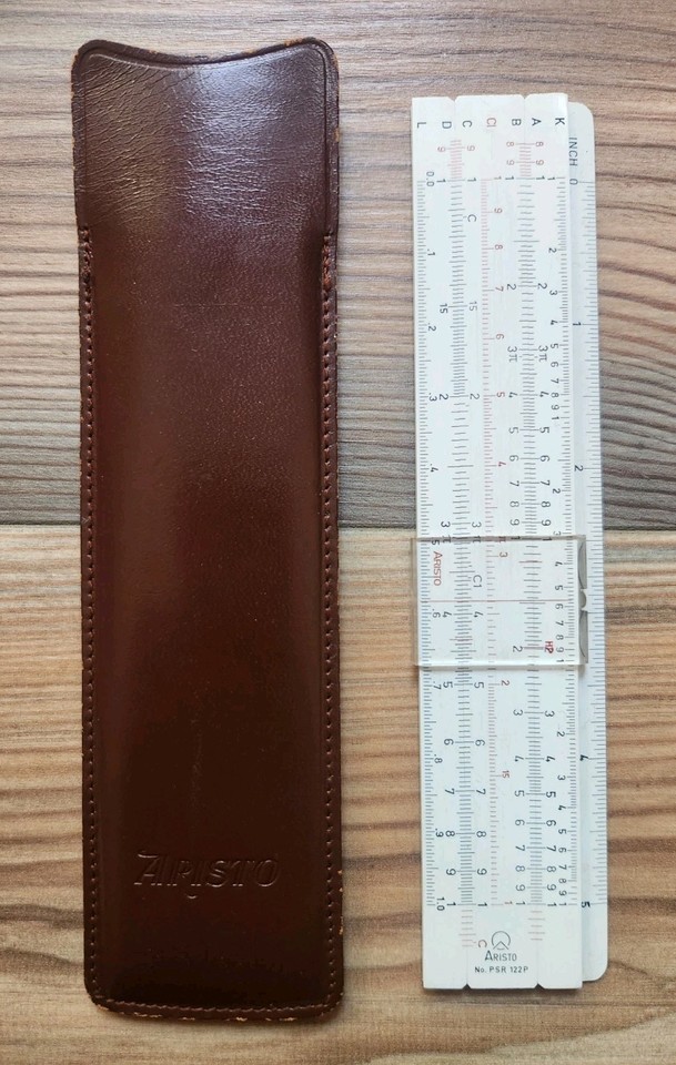 A West German Aristo Rietz slide rule in its original leather case — the Aristo brand was a beloved rival to K&E with a distinctly European engineering pedigree.
