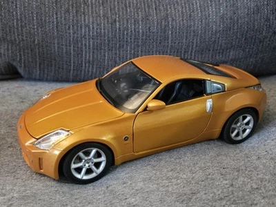 Maisto Special Edition 1:18 Diecast Nissan 350Z *CAR ONLY* Orange / Gold Silver  - Photo 1/4