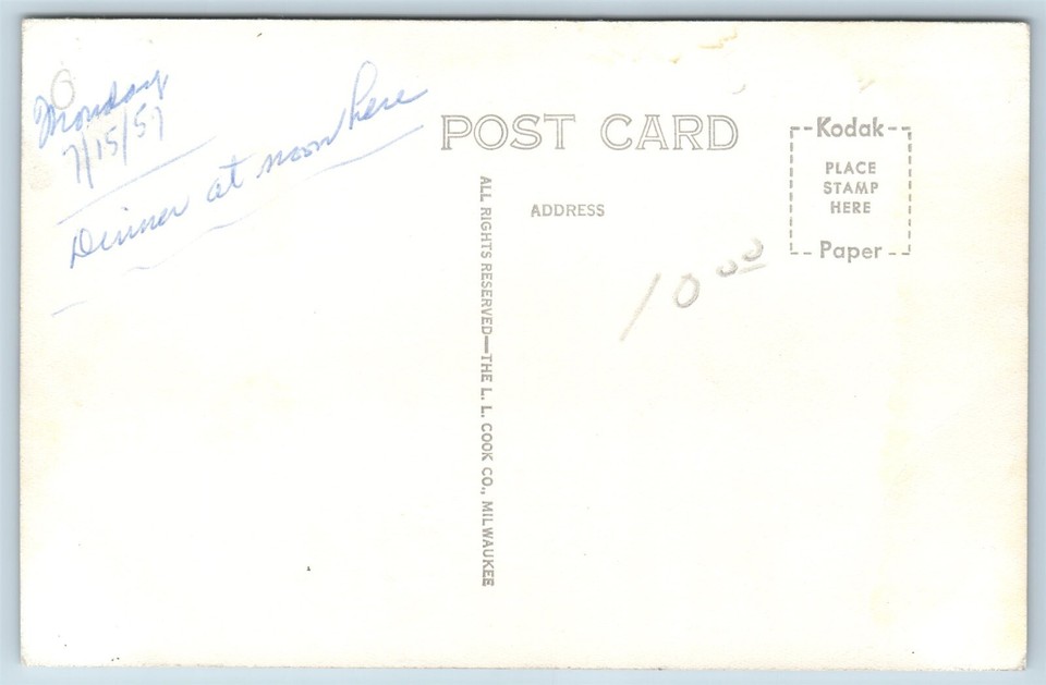 Postcard MN Luverne Main Street at McKenzie c1950s Cars Stores RPPC