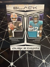 Travis Hunter / Shedeur Sanders #46/199  [Rookie] 2025 Panini Black Dusk 2 Dawn