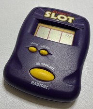 Vintage 1997 Radica Pocket Slot Handheld Electronic Casino Game Purple
