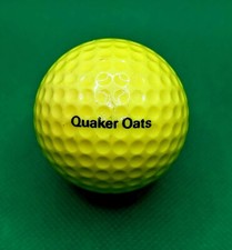 Vintage Yellow Quaker Oats logo golf ball