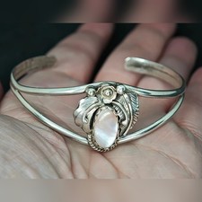 Navajo sterling silver squash blossom cuff bracelet featuring Mother of Pearl