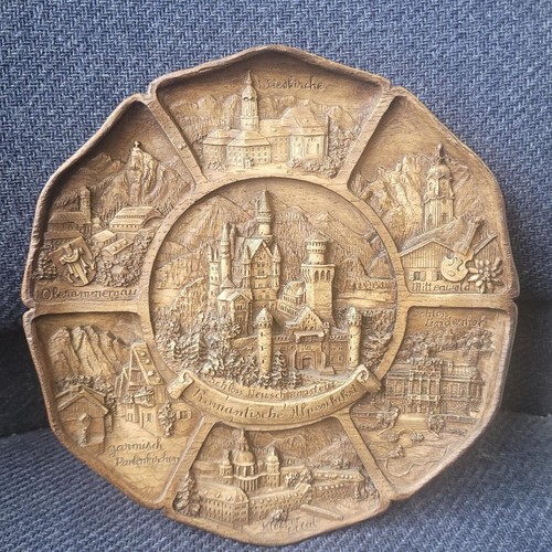 Wood decorative wall plate; 7 threedimensional pictures. 9''X9". MAYBE