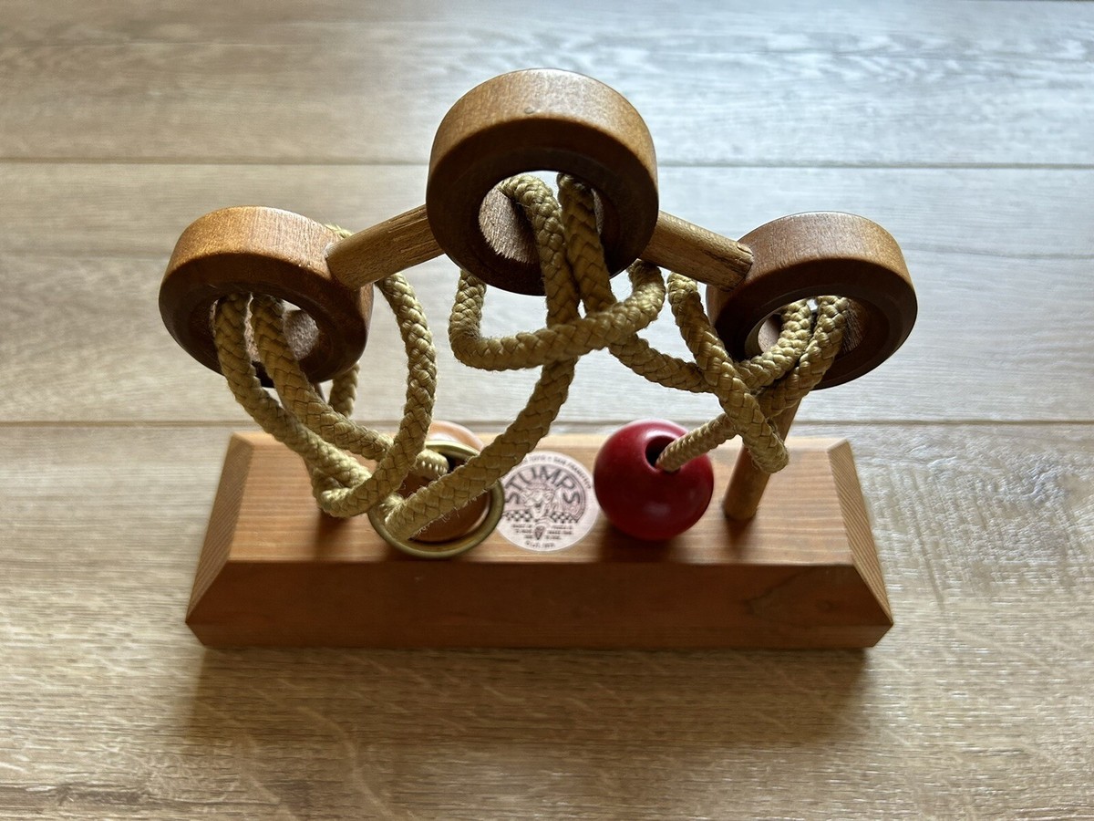 Vintage 1979 Stumps Wooden Brass Ring Lumberjack Toys Puzzle Toy