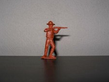MPC Cowboy firing Rifle in Brown plastic 54mm 1960s - 1970s