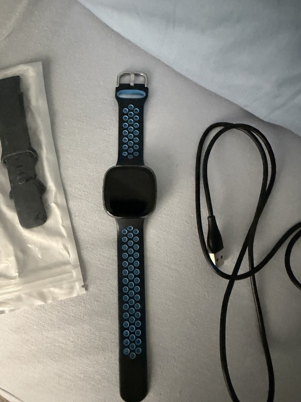 Smart Watch Black Case Black/Blue Silicone Band Extra Black Bands Charging Dock