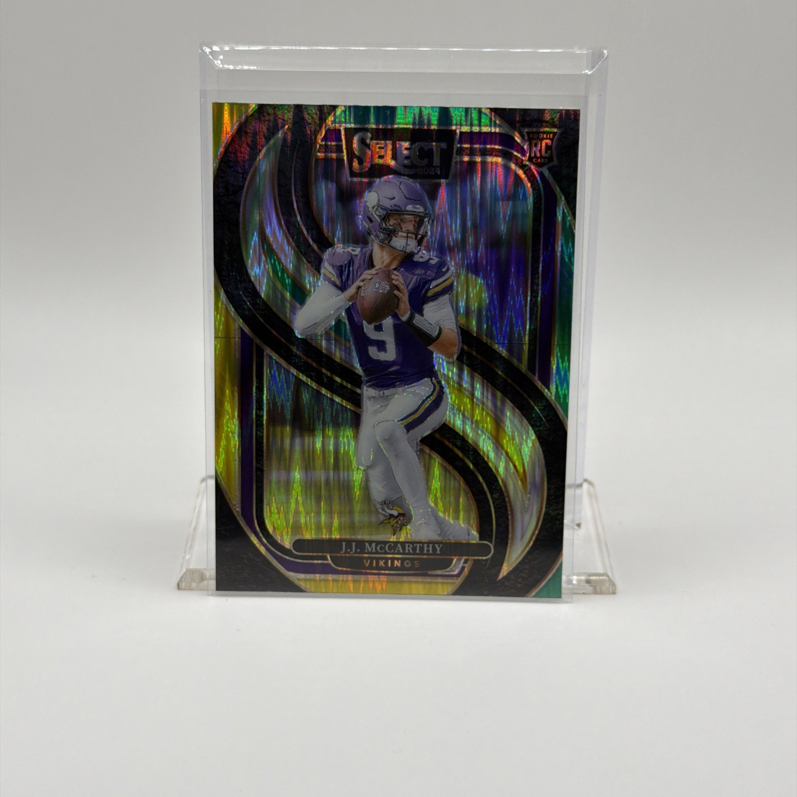 2024 Panini Select - Premier Level J.J. McCarthy #134 Green & Yellow Shock (RC)