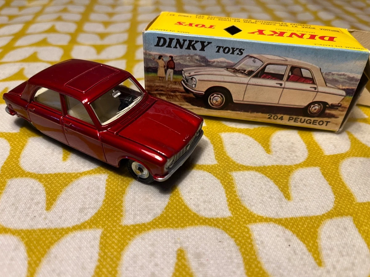 Dinky Toys Junior n° 101 Peugeot 404 peu fréquent repeinte