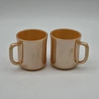 Vintage Fire King Peach Luster set of 2 coffee mugs