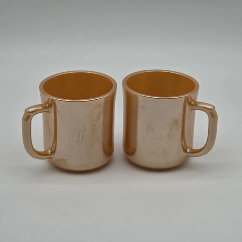 Vintage Fire King Peach Luster set of 2 coffee mugs