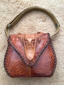alligator head purse