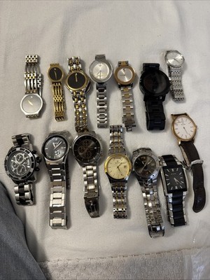 Assorted watch lot parts / Repair sold as is. 14 total movado , bulova, seiko