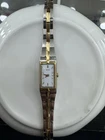 Vintage Seiko Women's Two-Tone Rectangle Analog Wristwatch White Dial Steel Band