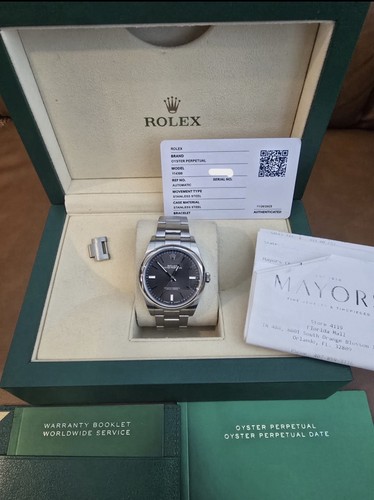 Rolex Oyster Perpetual 114300 Men's Automatic Stainless Steel Black Dial Watch