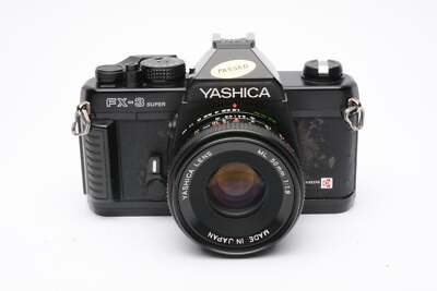 Yashica FX-3 35mm SLR w/50mm F1.9 ML lens, manual, cap, new seals