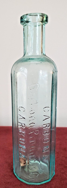 ANTIQUE CARBONA BOTTLE 1908 - CORK INSIDE, 12-SIDED AQUA GLASS, EMBOSSED WRITING