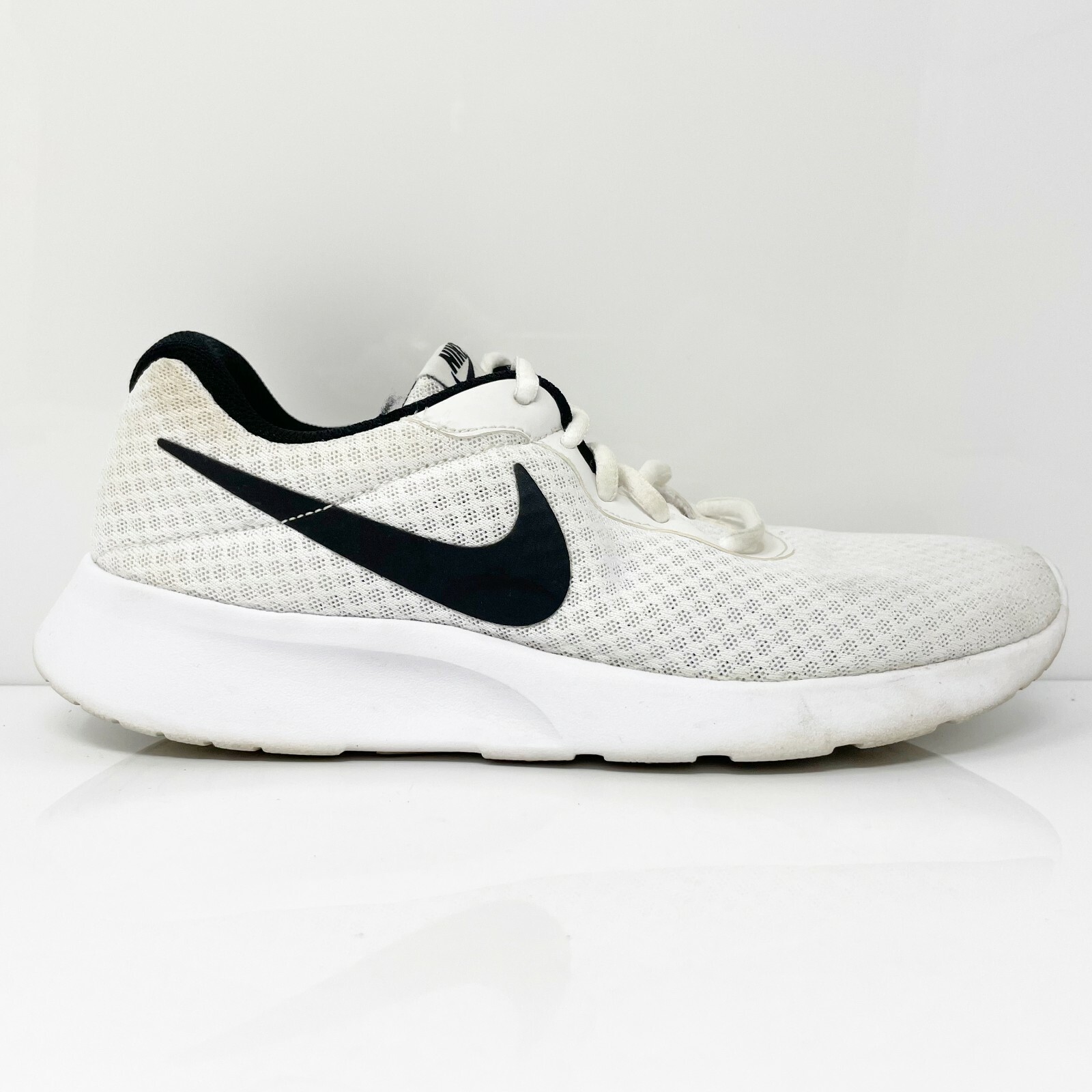 nike tanjun size 8