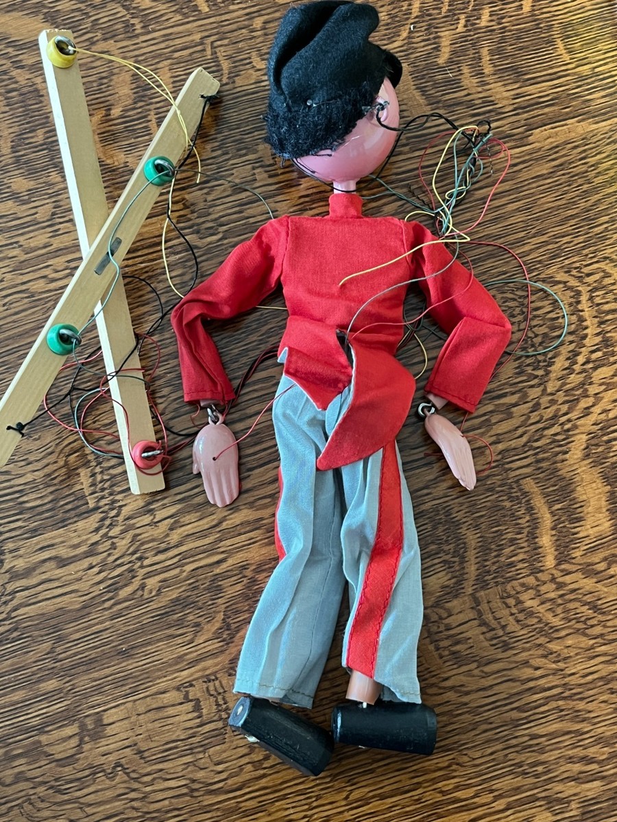 Four Pelham puppets, together with a Pelham puppet theatre - Mitzi, Fritzi, etc