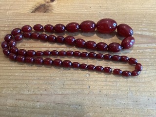 Art Deco Cherry Amber Necklace 82 cms long weight 65.38 Gradulated grams tested