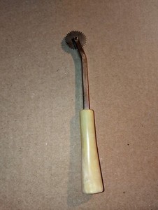 Vintage Bakelite handle tracing wheel