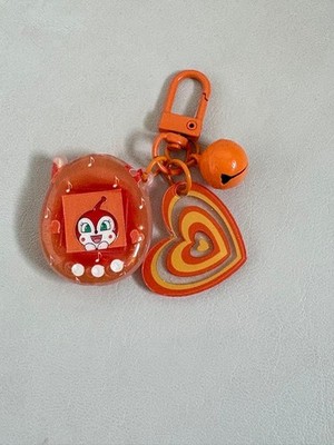Dokkin-chan Tamagotchi-shaped bead keychain