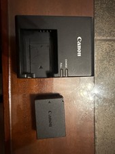 Canon EOS Rebel T100 DSLR Camera with EF-S 18-55mm f/3.5-5.6 Lens