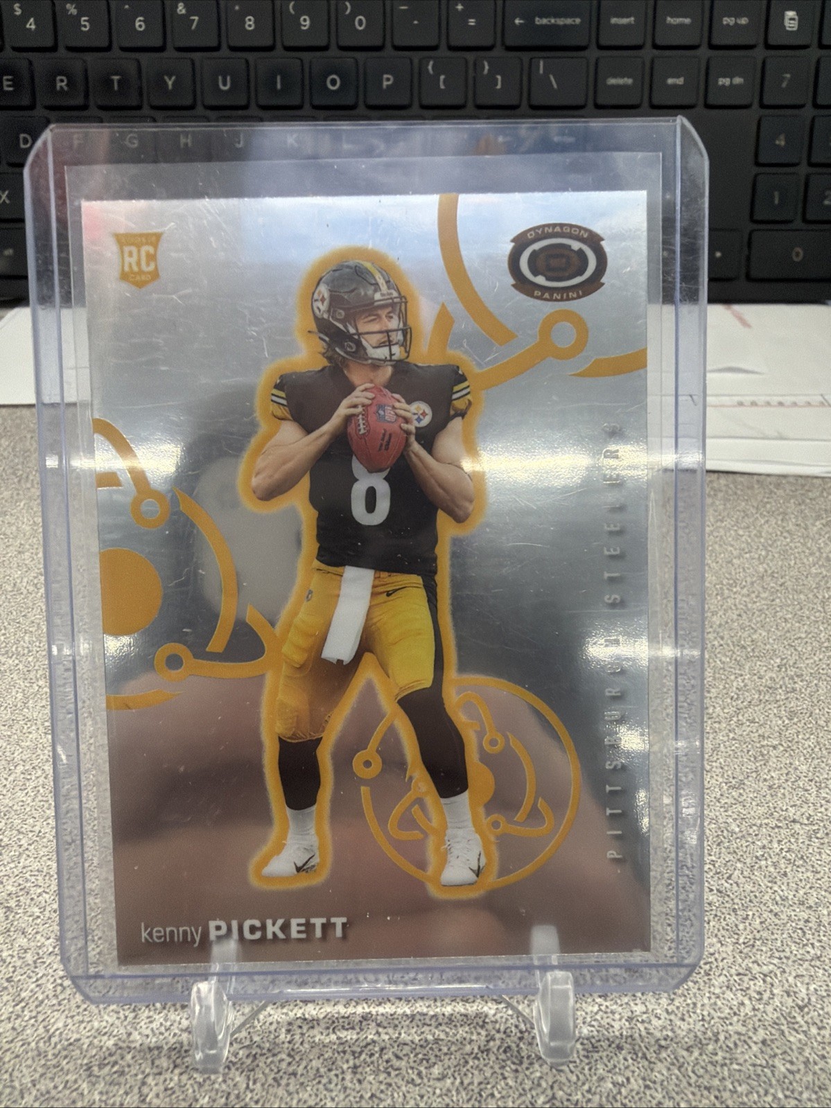 2022 Panini Chronicles - Dynagon Rookies Kenny Pickett #D-1 Silver (RC)