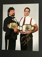 I.R.S.  (MIKE ROTUNDA) AUTOGRAPHED 8 X 10 PHOTO W/ MILLION DOLLAR MAN