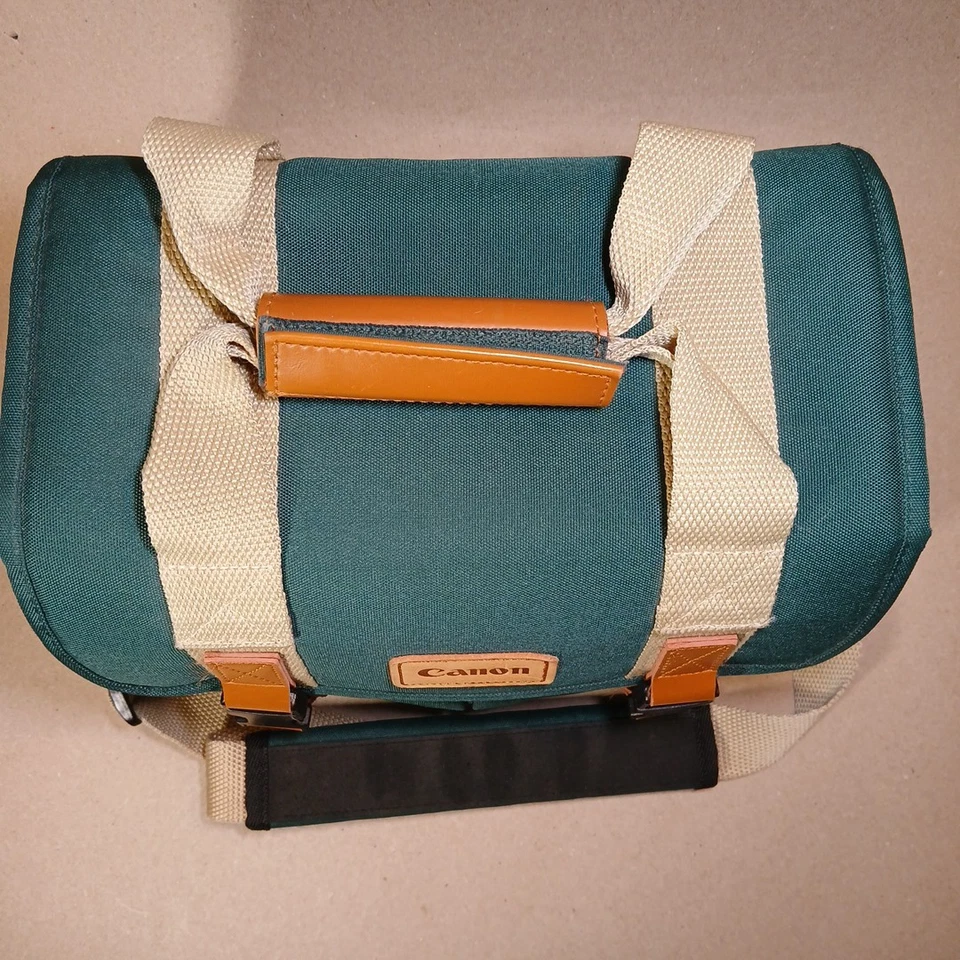 Bolsa organizadora retro para cámara Canon bolsillos verdes correa para el hombro DSLR estuche de transporte Foto 2 de 4