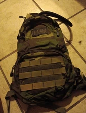 CamelBak Maximum Gear Hydration Backpack Woodland Camo Tactical Military Bag