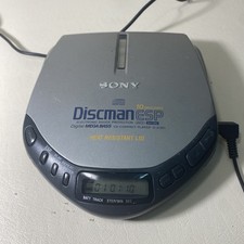 SONY DISCMAN D-E301 FULLY FUNCTIONAL WITH ORIGINAL CIGARETTE LIGHT POWER SUPPLY.