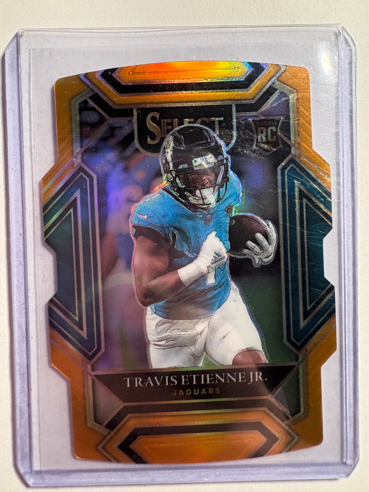 K322,469 - 2021 Select Prizm Orange Die Cut #254 Travis Etienne Jr. #/249