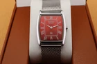 Vintage Seiko Slim Quartz Men's Wrist Watch Red Dial with Silver Mesh band.