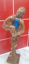 Abstract Sculpture Of A Woman - may be paper machet - gold/bronze COLOUR