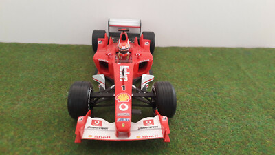 F1 FERRARI F2003 GA M. SCHUMACHER SPONSOR MARLBORO au 1/18 HOT