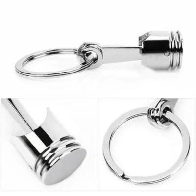 Metallkolben Auto Schlüsselanhänger Schlüsselanhänger Motor Autoanhänger Schlüsselanhänger Ring Schlüsselring