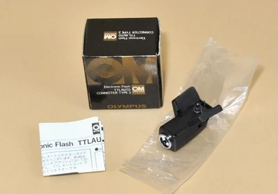 Boxed Olympus Electric Flash TTL Auto Connecter T20. Perfect size for a pocket