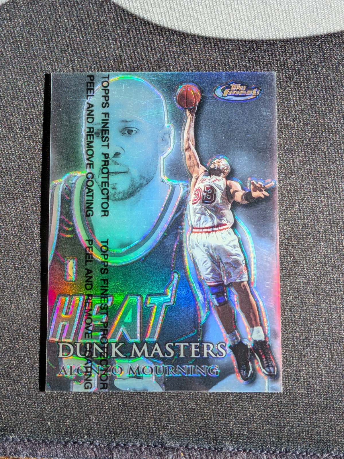 1999-00 Topps Finest Dunk Masters Alonzo Mourning Refractor w/ Peel 112/150 MINT