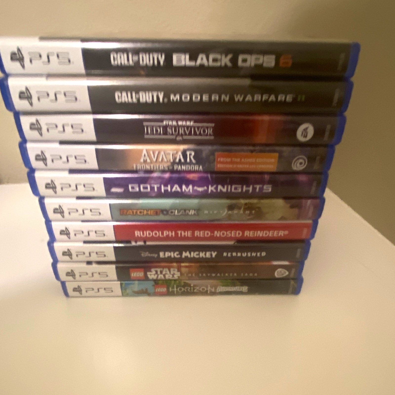Lotto 10 giochi PS5 PlayStation 5 con custodie Call of Duty Star Wars LEGO DC Avatar