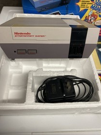 Nintendo NES Challenge Set.  Box, Manual, Console, Power Adapter And Game Genie.
