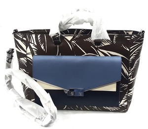 are tory burch bolsas real leather