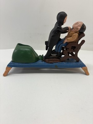 Cast Iron Mechanical Bank Dentist Pulling Teeth  it Works 