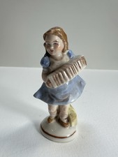 Collectible Porcelain Girl Figurine Playing the Accordion Germany Piano babies