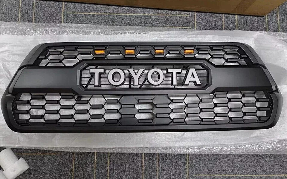 Parrilla de parachoques delantero para Tacoma 2016-2023 con luces LED ámbar y sensor de decoración Foto 3 de 4